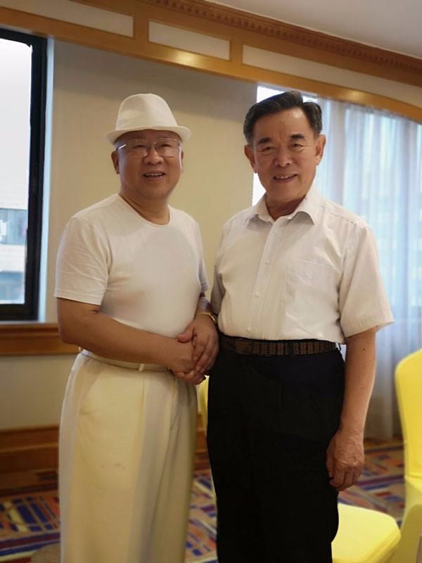 ●会长接待青岛市政协主席胡延森同志。.jpg